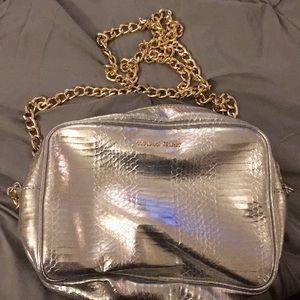 Silver Victoria’s Secret purse with gold chain
